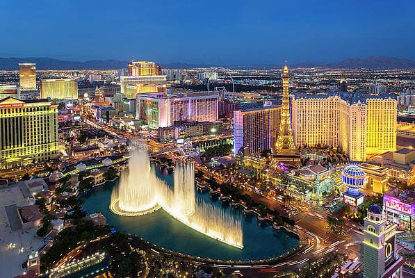Las Vegas skyline at dusk with illuminated buildings
